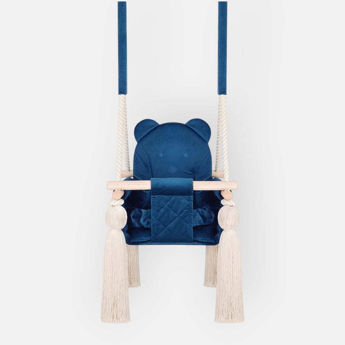 Kinderschaukel für Zuhause Marineblau in der Vorderansicht mit gesteppter Sitzfläche, Holzstange und Quasten